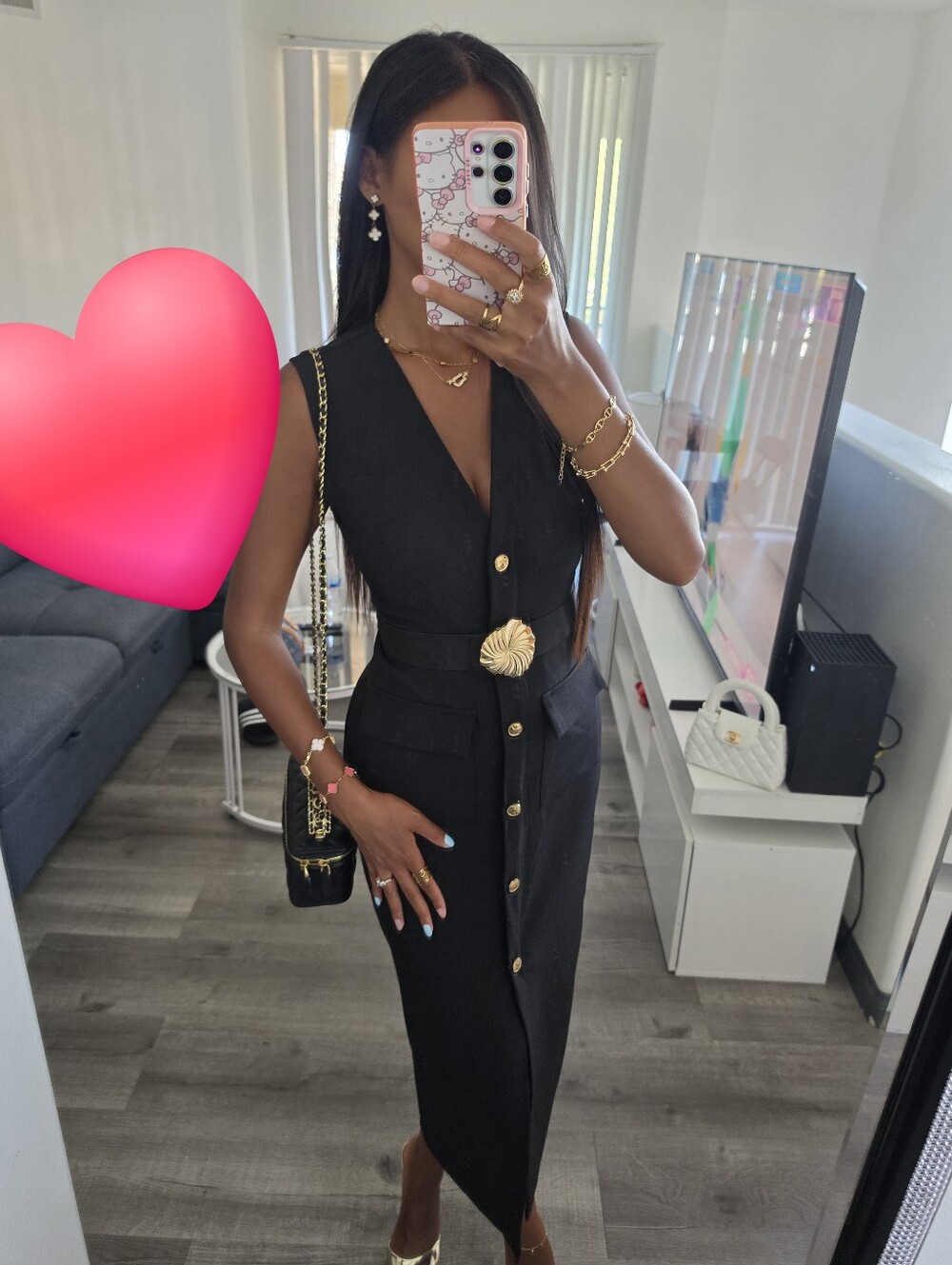 Elegant Black Sleeveless Midi Dress with Decorative Belt